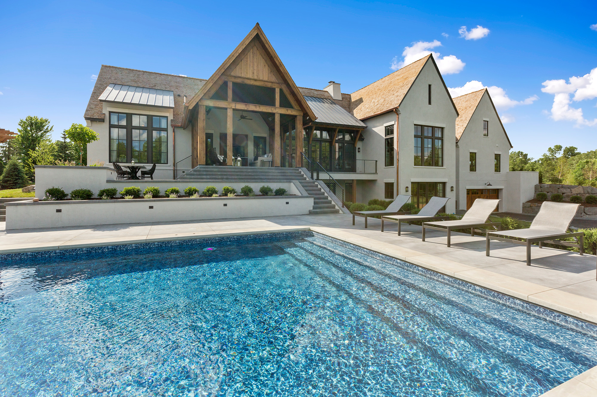 Luxury Charlotte home with pristine swimming pool — Crown and Current Pool Co. service area